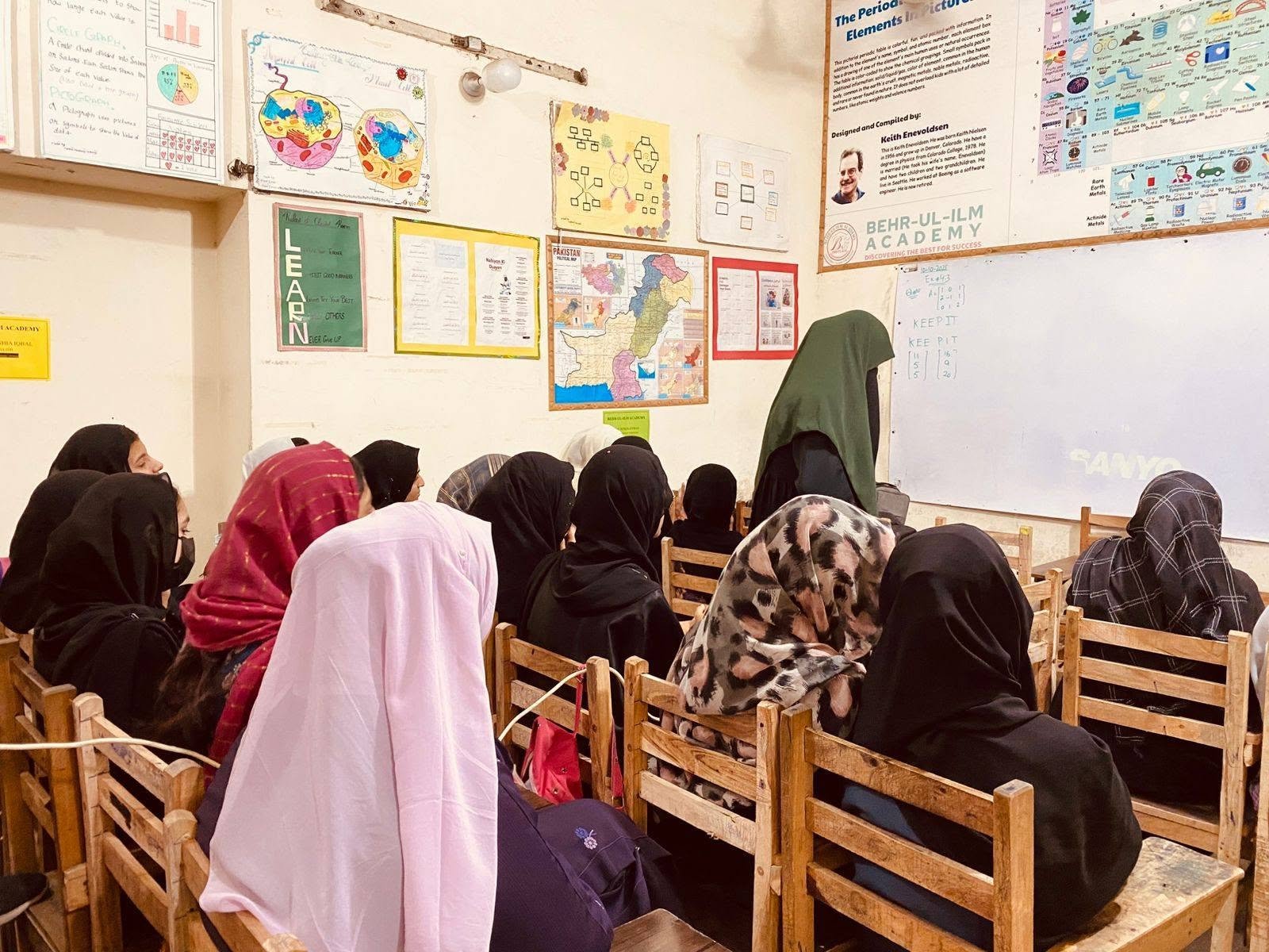 Students attending a class at Behr-ul-Ilm Academy